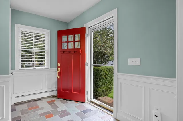 a living room with furniture and a couch