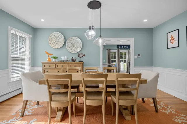a view of a dining room with furniture