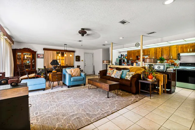 a kitchen with stainless steel appliances a sink and counter