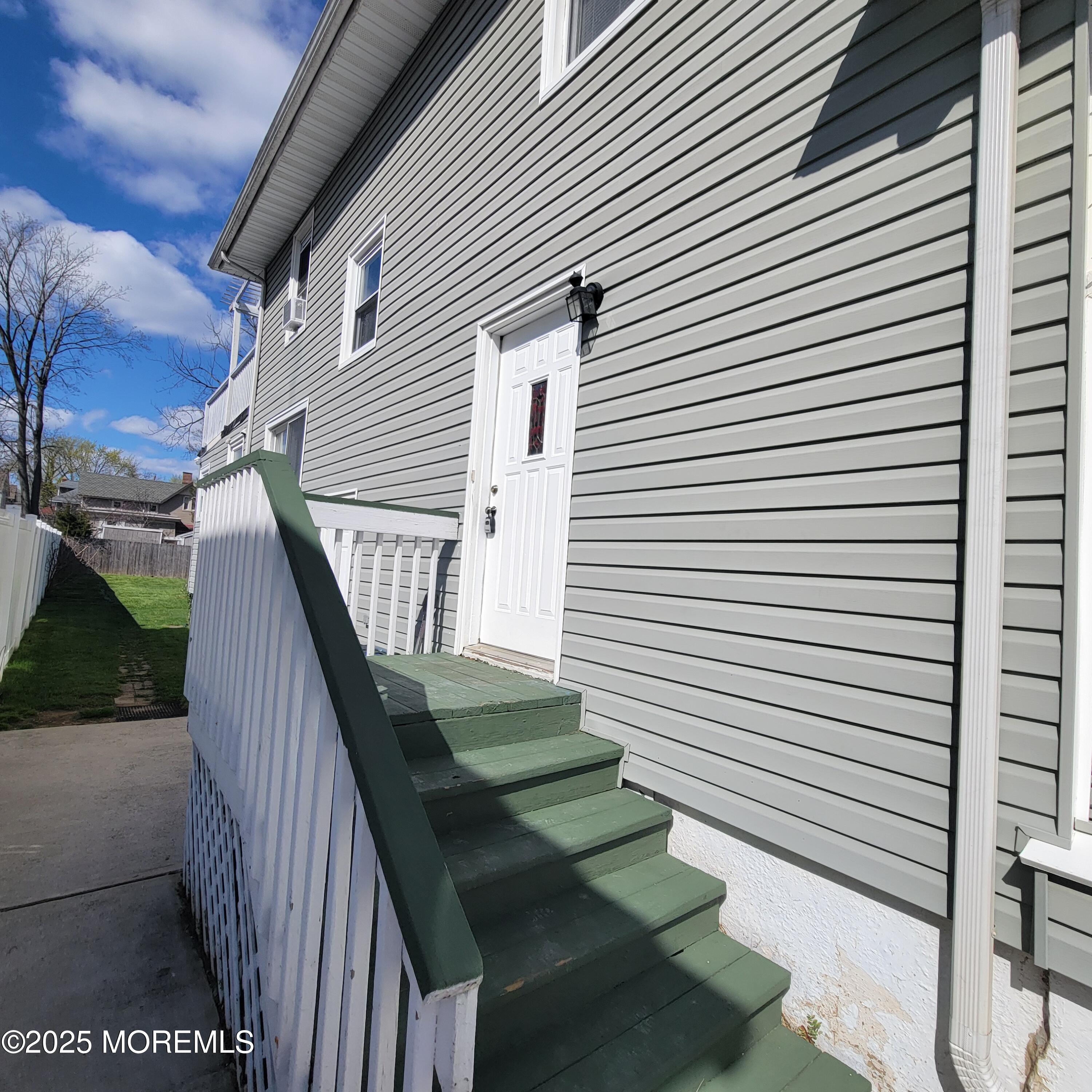 100 3rd Street Keyport, NJ 07735 - Photo 2 of 14 a view of deck with a white roof