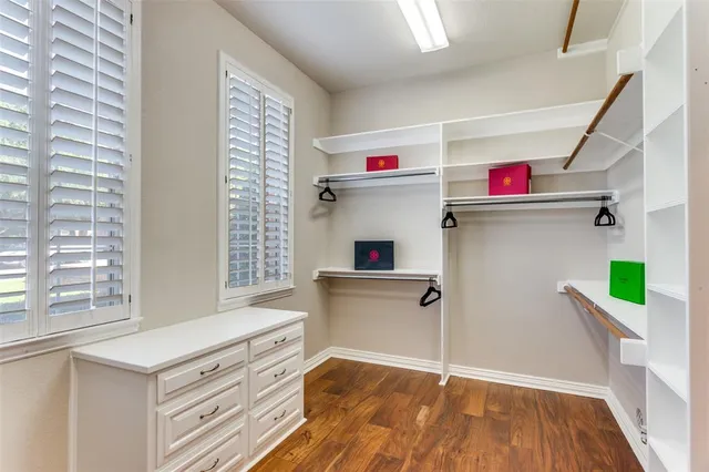 a kitchen that has a cabinets and window