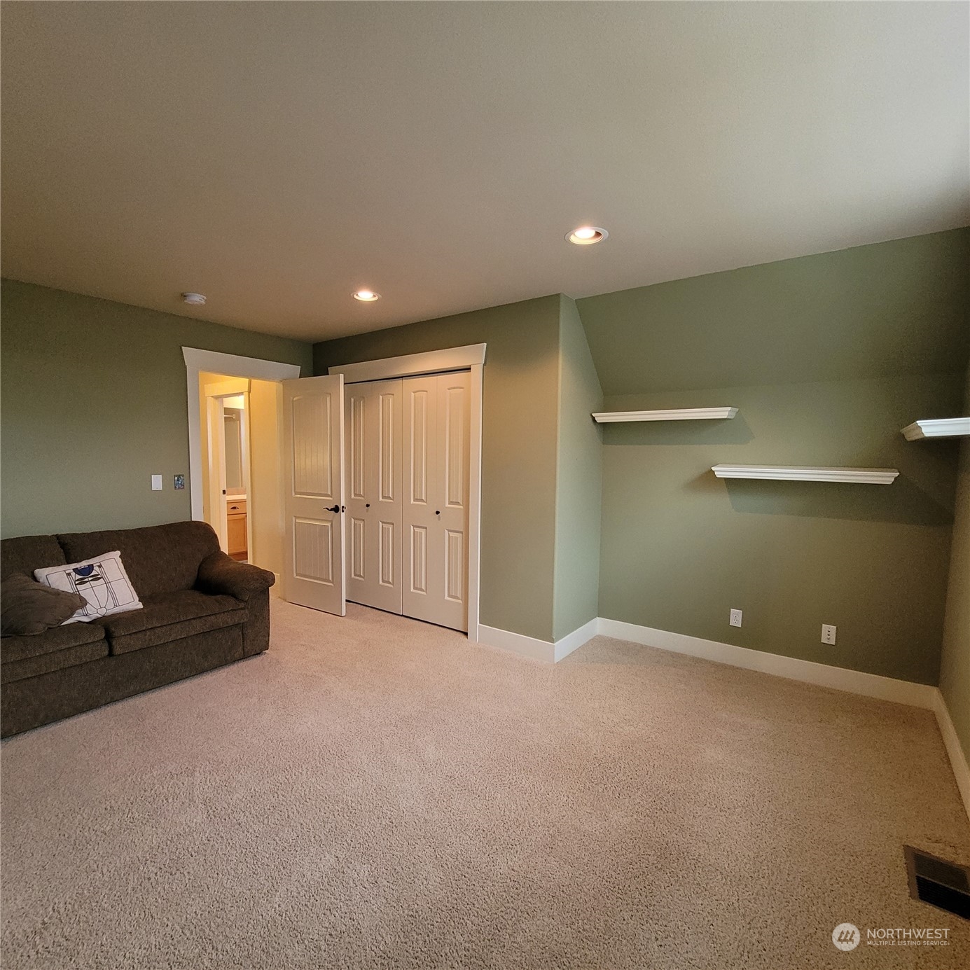 151 Craftsman Court Sequim, WA 98382 - Photo 23 of 40 a living room with furniture and a air conditioner vent