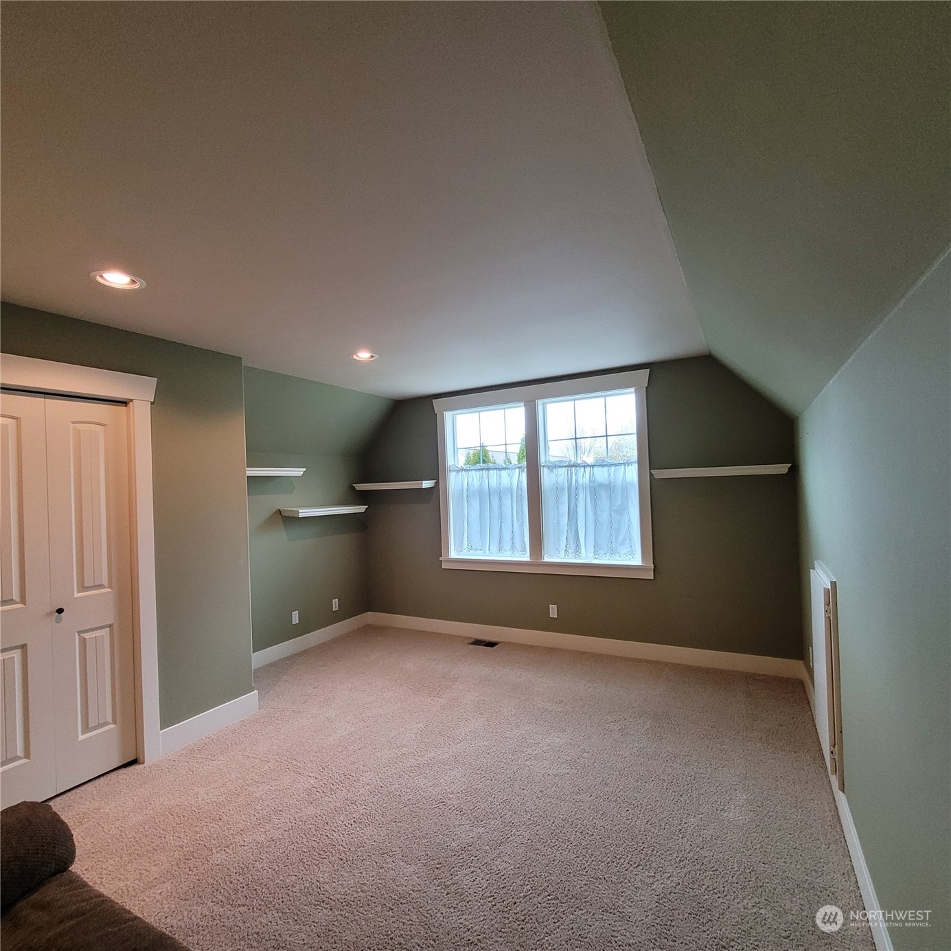 151 Craftsman Court Sequim, WA 98382 - Photo 24 of 40 a view of an empty room with a window