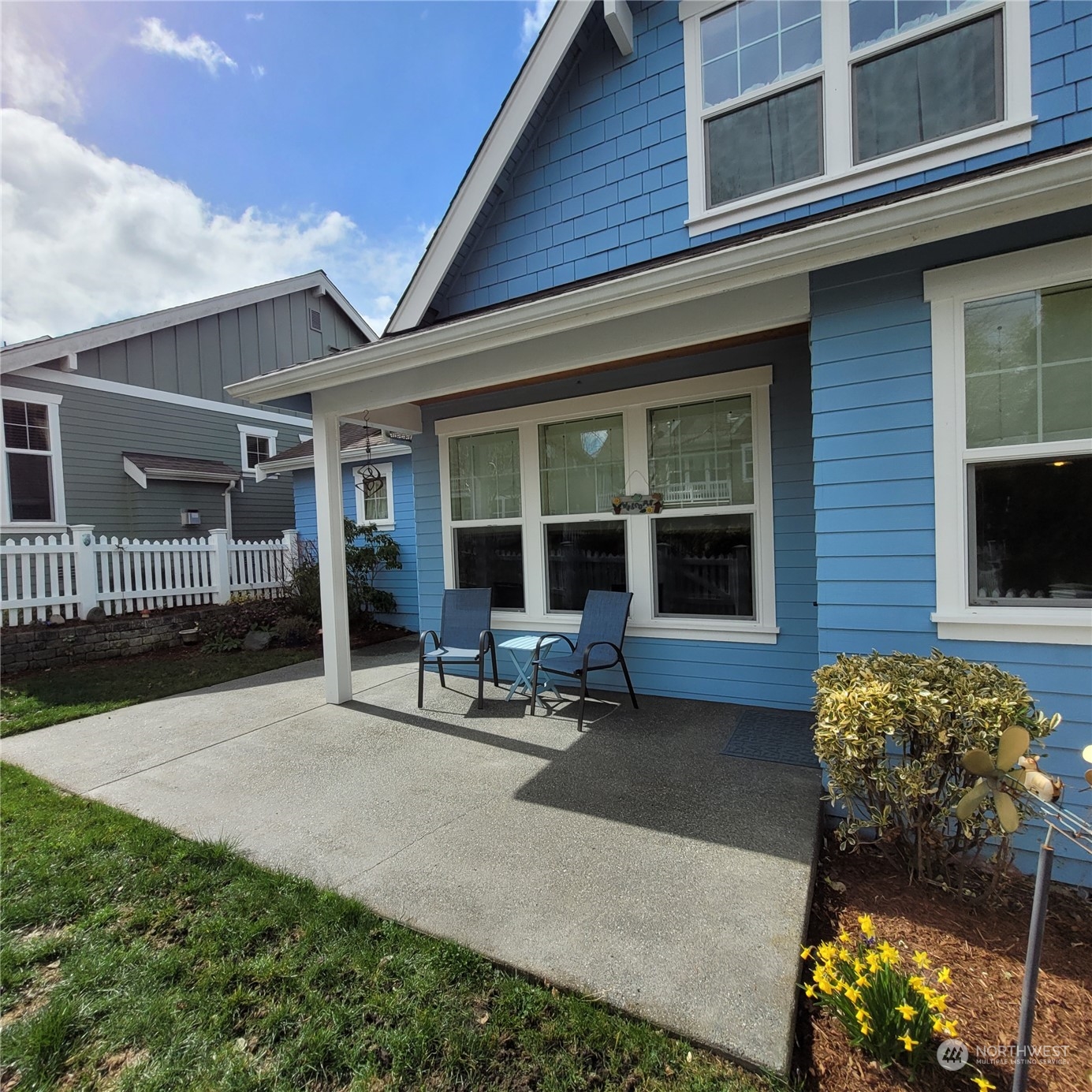 151 Craftsman Court Sequim, WA 98382 - Photo 27 of 40 a view of a house with backyard sitting area and garden