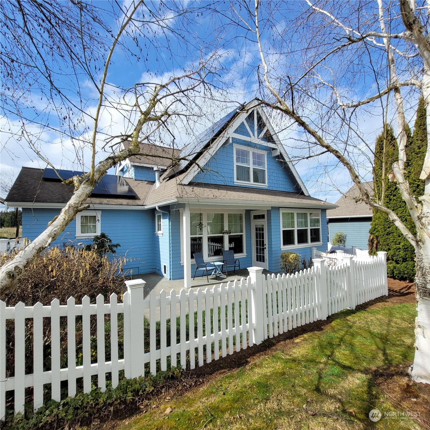 151 Craftsman Court Sequim, WA 98382 - Photo 29 of 40 a front view of a house with a garden