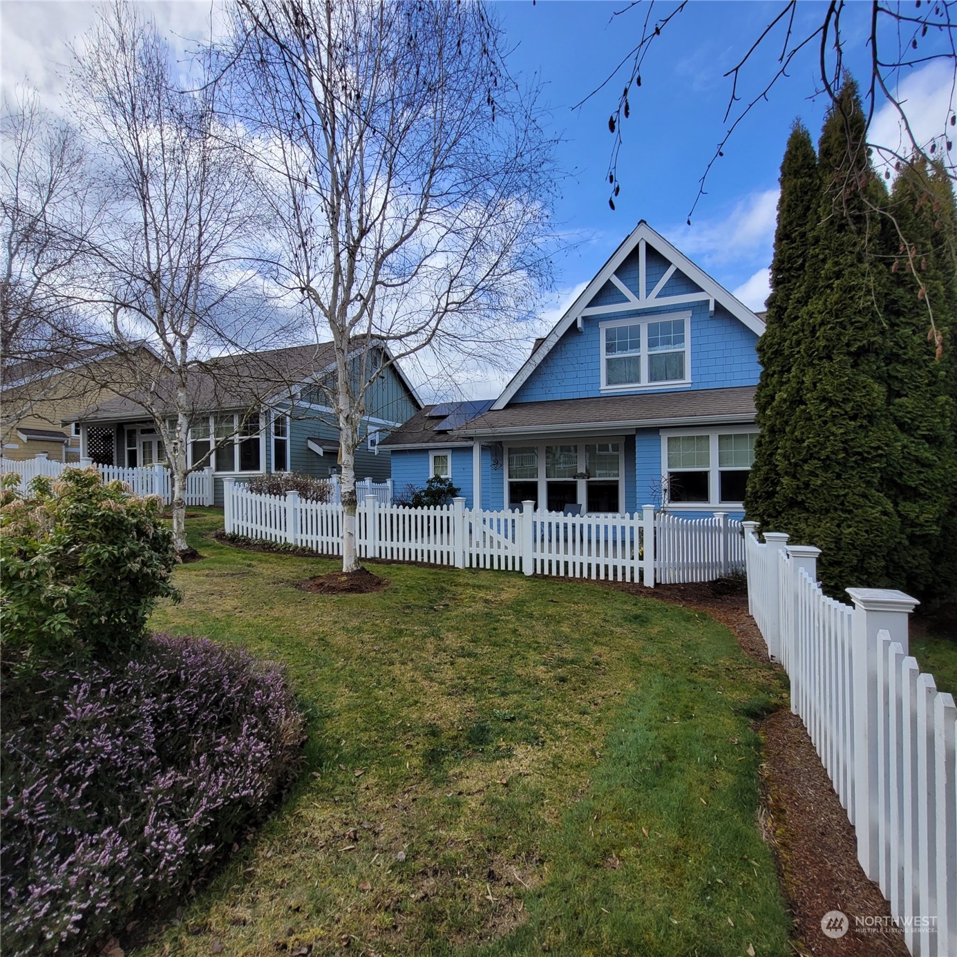 151 Craftsman Court Sequim, WA 98382 - Photo 31 of 40 a front view of a house with garden