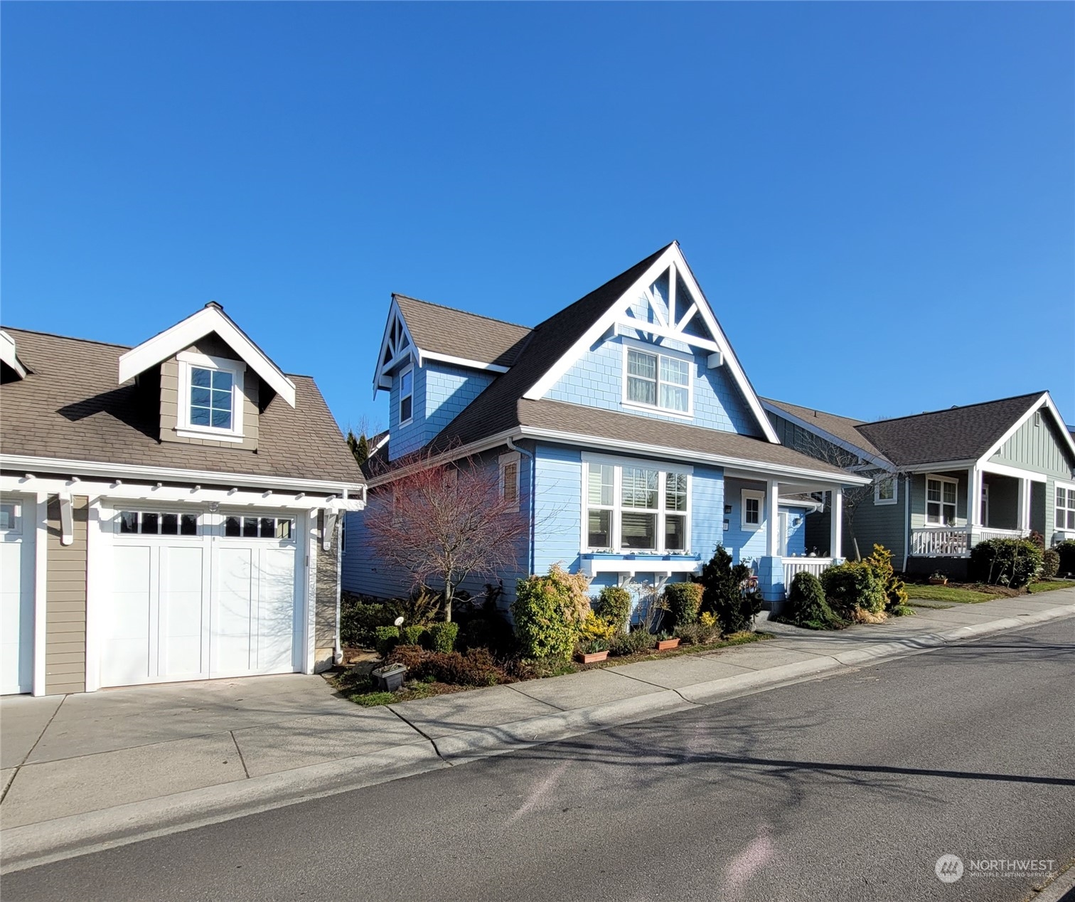 151 Craftsman Court Sequim, WA 98382 - Photo 33 of 40 a front view of a house with a yard