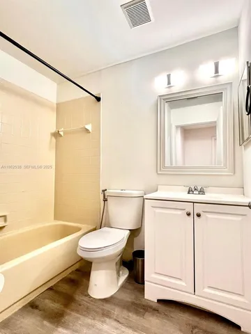 a view of swimming pool from a balcony