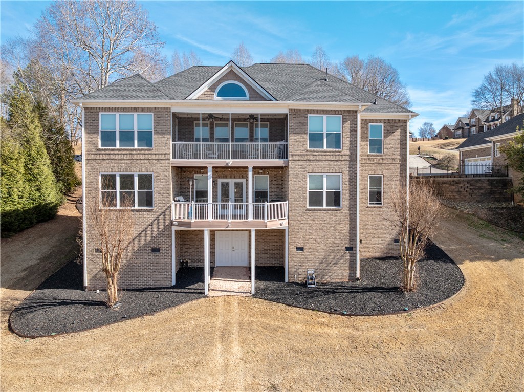 119 Turnberry Road Anderson, SC 29621 - Photo 45 of 50 This grand residence showcases multiple levels of expansive outdoor living, perfect for enjoying the views.