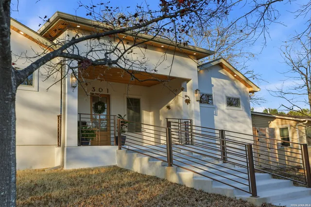 a view of a house with a street