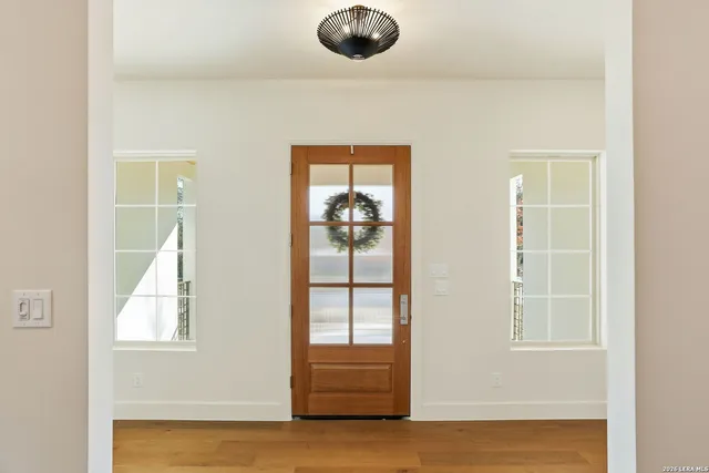 a bathroom with a sink double vanity and a mirror