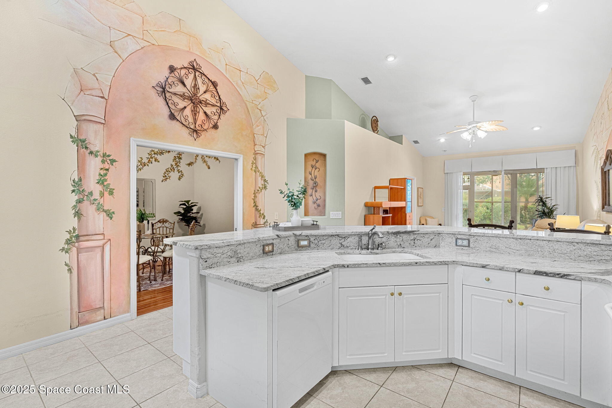2700 Camberly Circle Melbourne, FL 32940 - Photo 12 of 50 a kitchen with a sink and cabinets