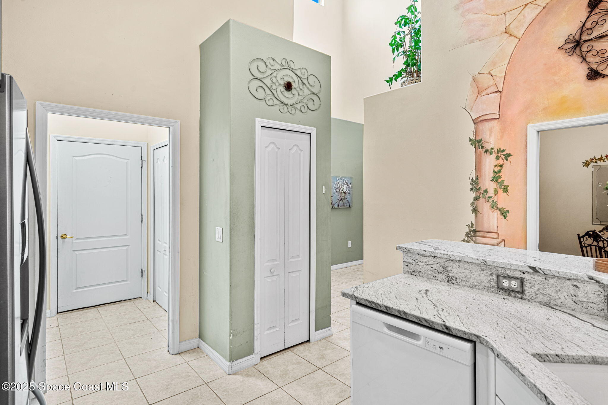 2700 Camberly Circle Melbourne, FL 32940 - Photo 13 of 50 a bathroom with a granite countertop sink and a mirror