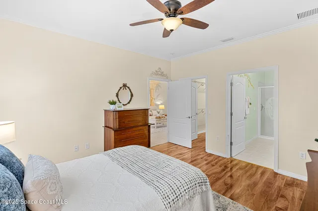 a spacious bathroom with a double vanity sink and a mirror