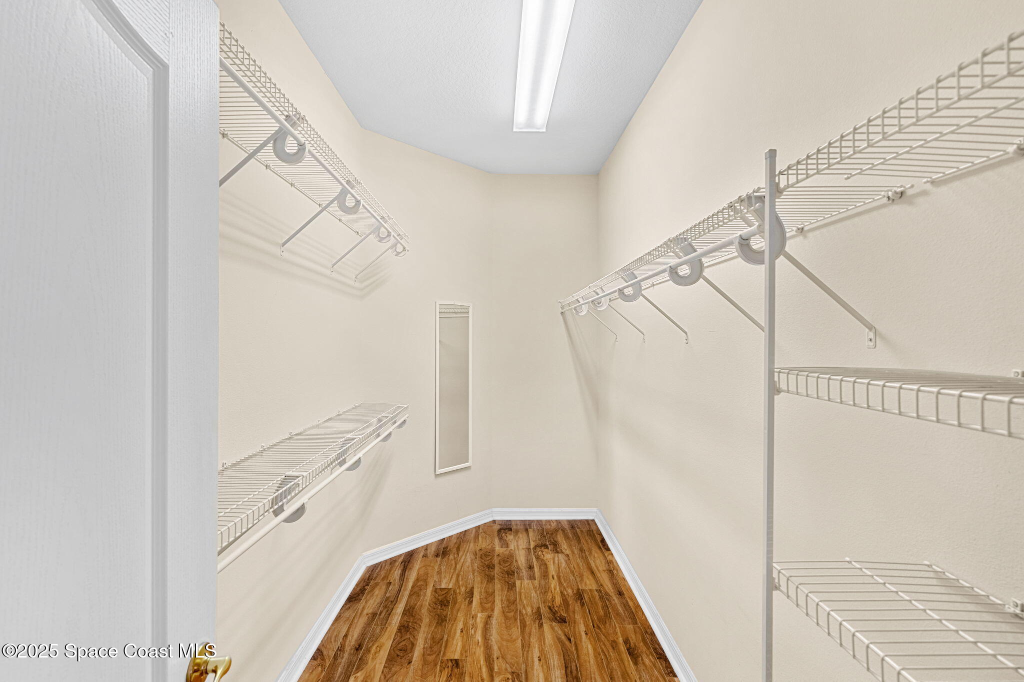 2700 Camberly Circle Melbourne, FL 32940 - Photo 21 of 50 a view of a hardwood floor and an entryway