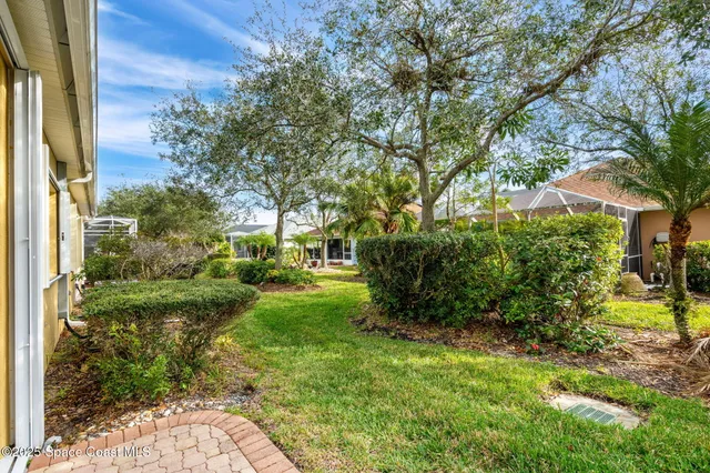 an aerial view of residential building and ocean