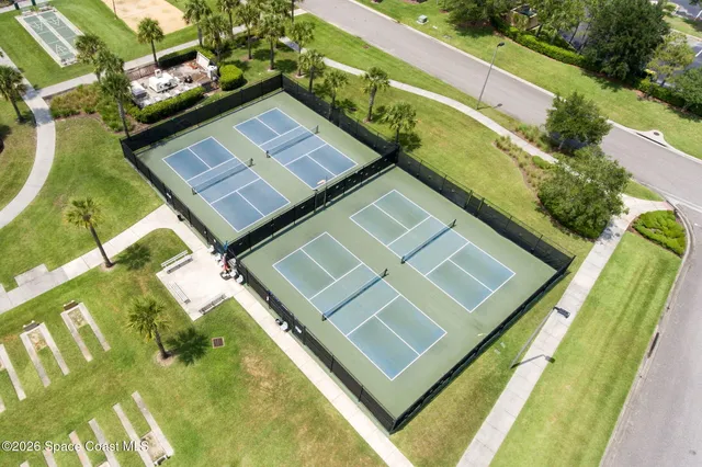an aerial view of a house with a outdoor space