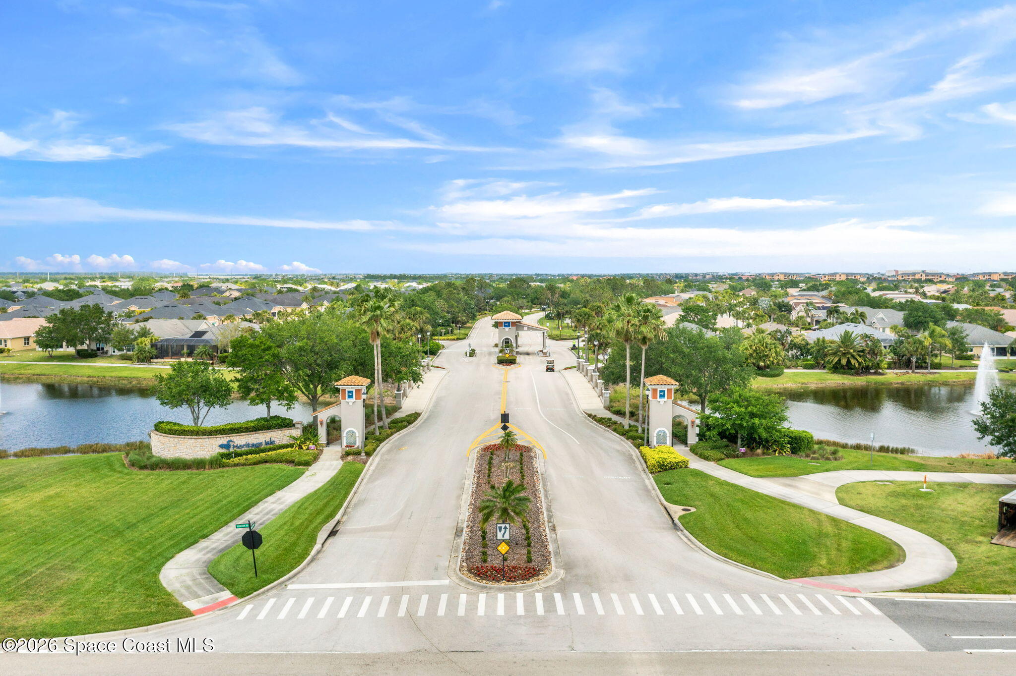 2700 Camberly Circle Melbourne, FL 32940 - Photo 48 of 50 a view of a lake with a yard