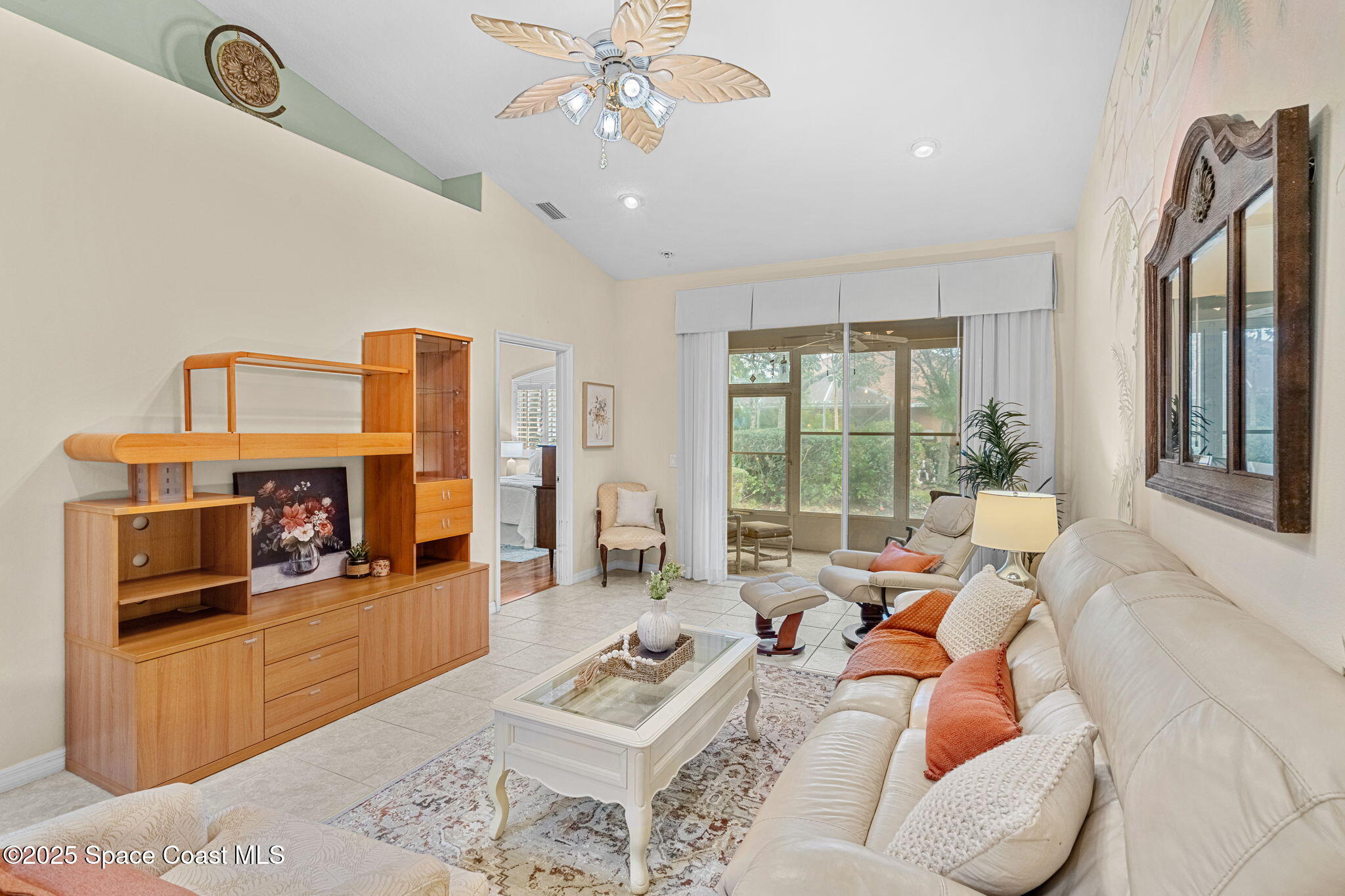 2700 Camberly Circle Melbourne, FL 32940 - Photo 8 of 50 a living room with furniture and a flat screen tv