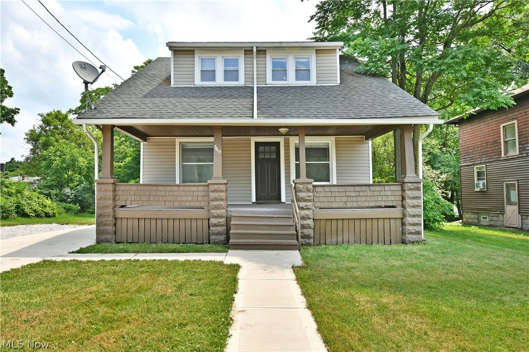 3617 South Main Street Mineral Ridge, OH 44440 - Photo 1 of 34 View of front of property with a front yard and a porch