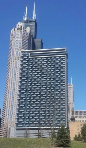 a bathroom with a sink toilet vanity and tub