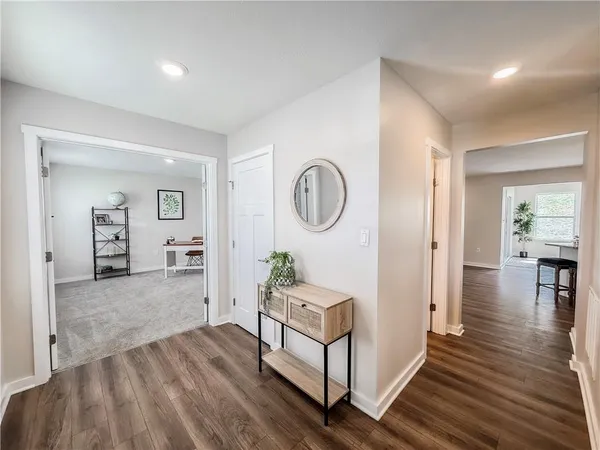 a living room with furniture and a table