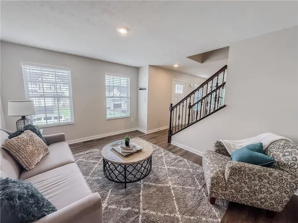 a room with furniture and windows