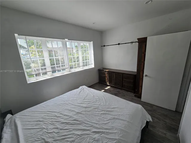 a view of empty room with windows