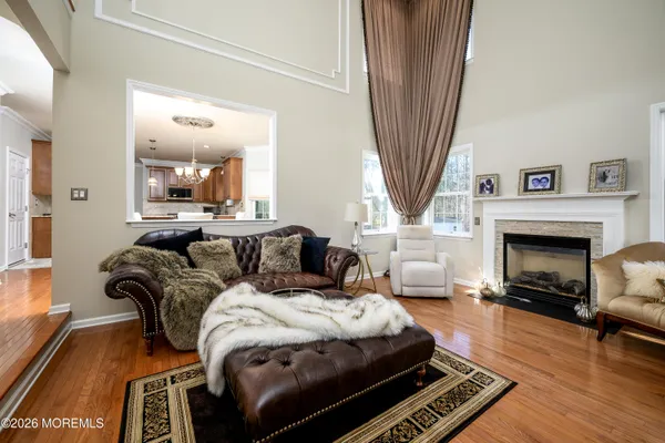 a bedroom with a bed and a fireplace