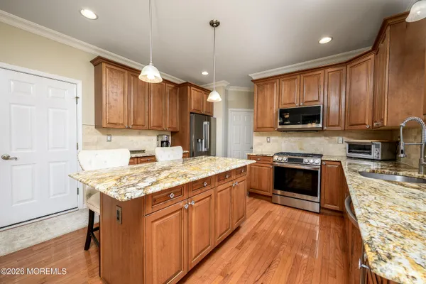 a living room with furniture fireplace and a flat screen tv