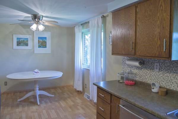 404 Slaughter Hollow Road Irwin, PA 15642 - Photo 5 of 10 Kitchen. EIK is neutral w/updates. Nice ceramic backsplash and updated appliances can stay.<BR/>