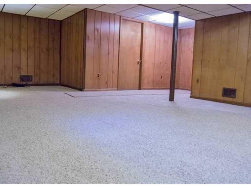 404 Slaughter Hollow Road Irwin, PA 15642 - Photo 10 of 10 Basement/Game Room. Gameroom with new carpet is very spacious.