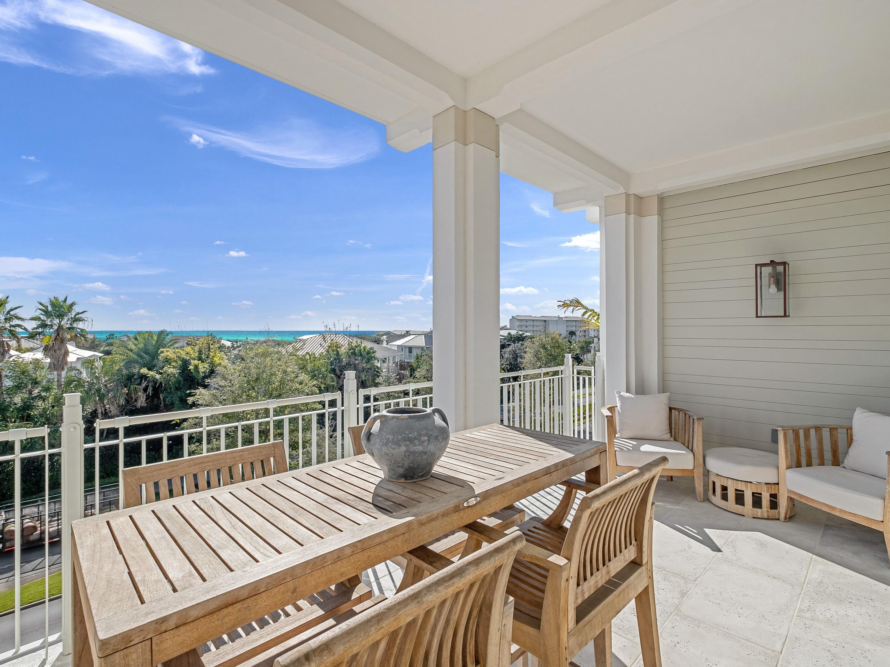45 West Solaire Way Inlet Beach, Unit 303 Inlet Beach, FL 32461 - Photo 2 of 35 Blake Jones Kaiya 303 - 02_Balcony Dinin