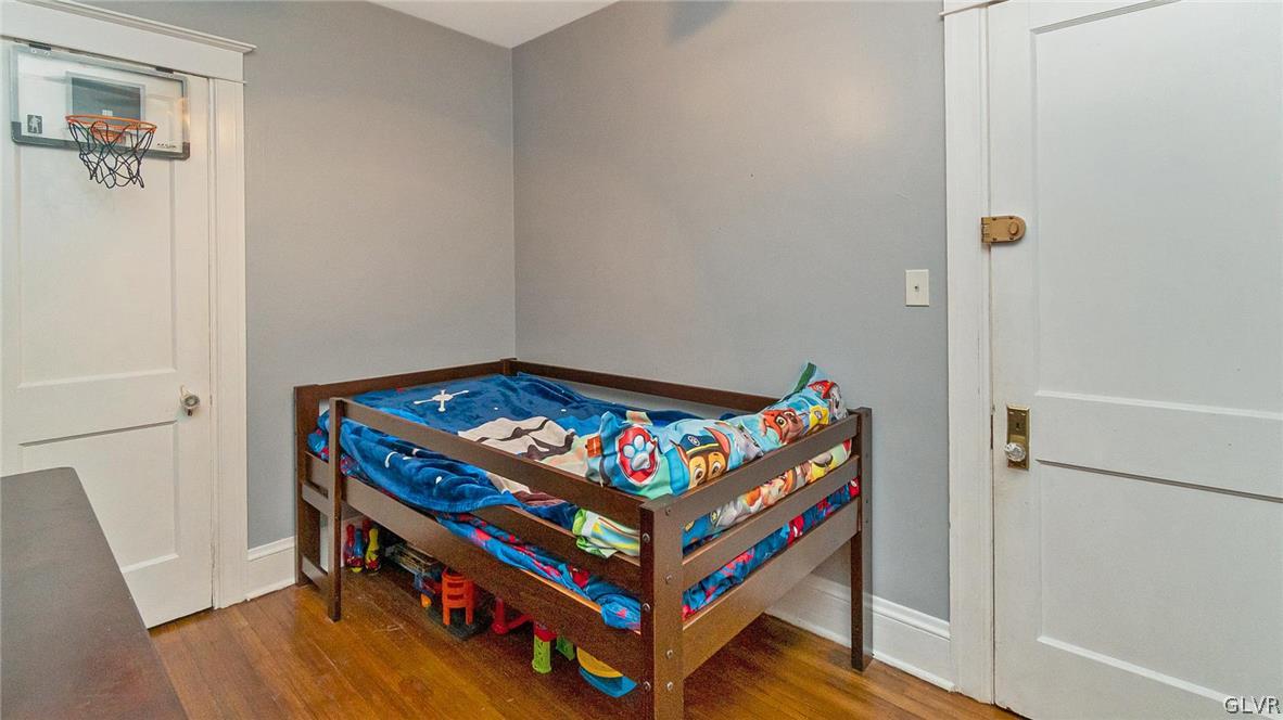 1340 Butler Street Easton, PA 18042 - Photo 11 of 18 a room with a wooden floor and a table