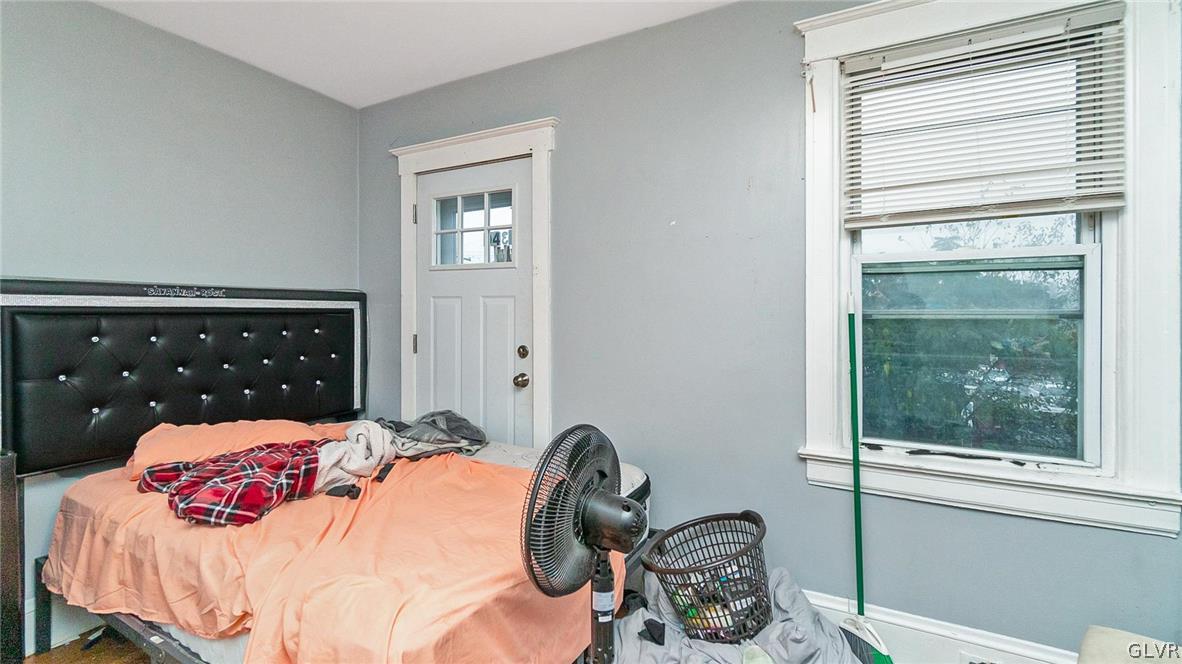 1340 Butler Street Easton, PA 18042 - Photo 13 of 18 a bedroom with a bed and a dresser