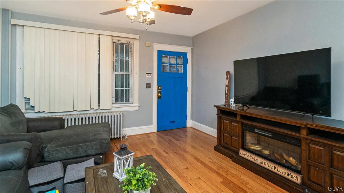 1340 Butler Street Easton, PA 18042 - Photo 4 of 18 a living room with furniture and a flat screen tv