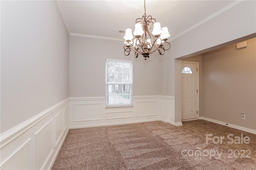 6415 Hermsley Road Charlotte, NC 28278 - Photo 4 of 15 a view of an empty room with a window