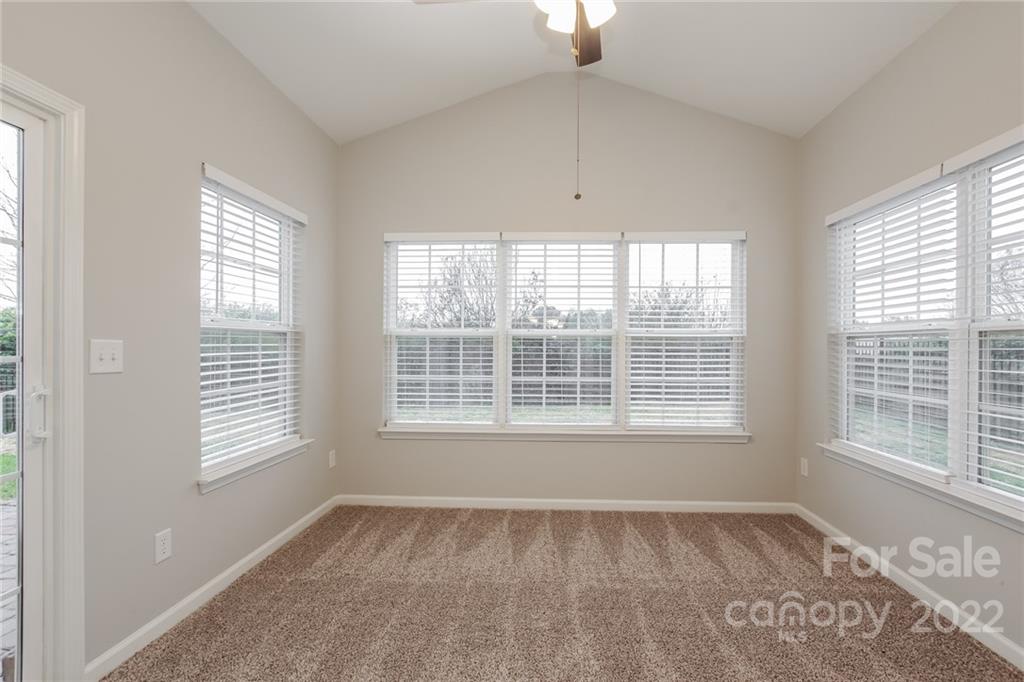 6415 Hermsley Road Charlotte, NC 28278 - Photo 7 of 15 a view of an empty room with a window