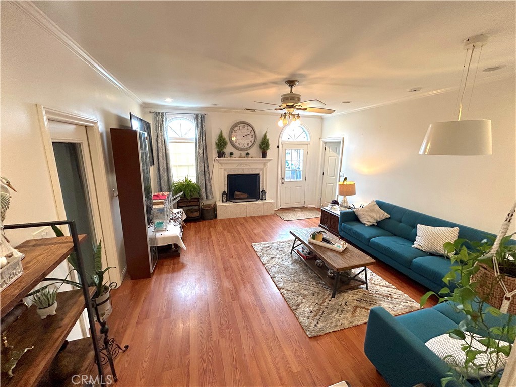 9530 Bexley Drive Pico Rivera, CA 90660 - Photo 11 of 22 a living room with furniture fireplace and a flat screen tv
