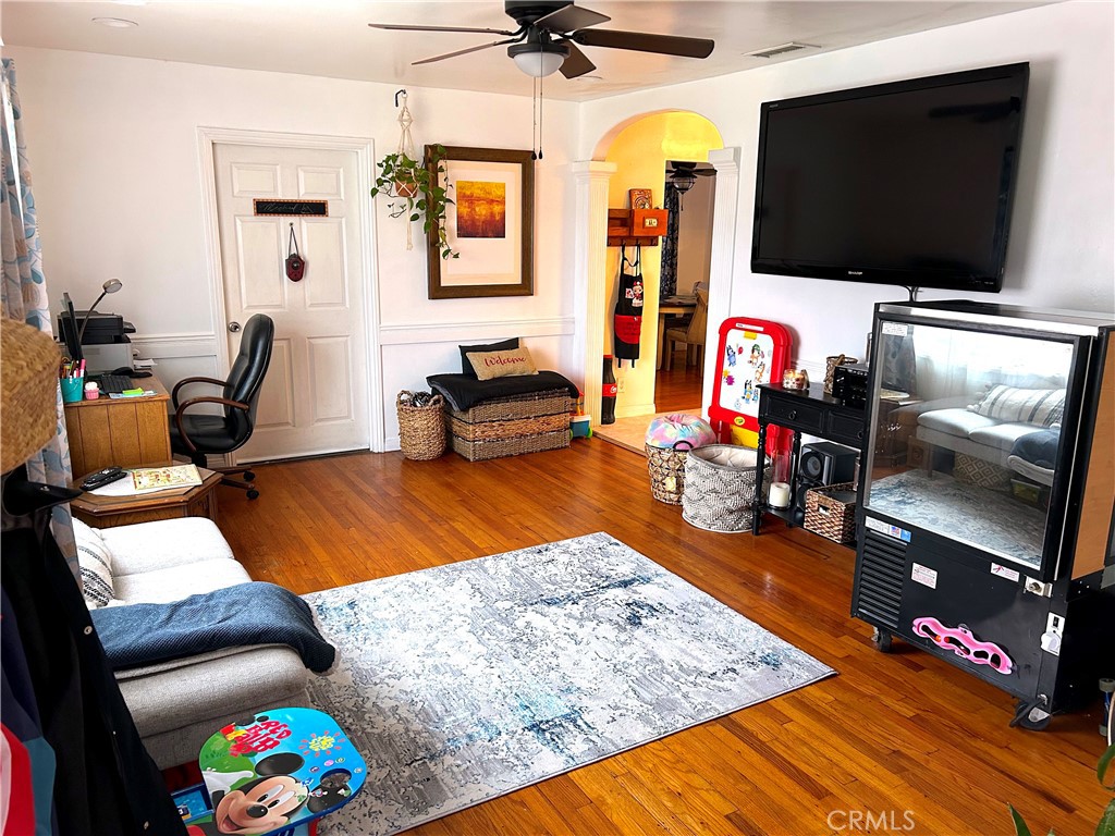 9530 Bexley Drive Pico Rivera, CA 90660 - Photo 3 of 22 a living room with furniture and a flat screen tv