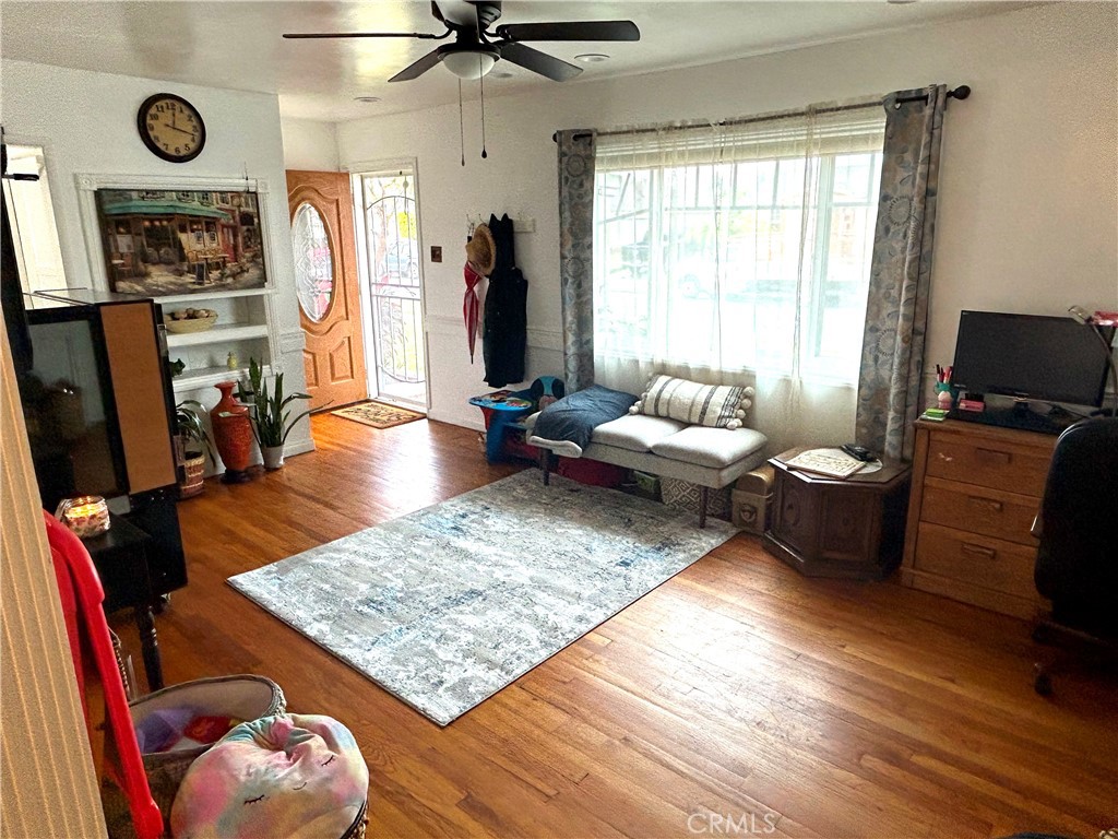 9530 Bexley Drive Pico Rivera, CA 90660 - Photo 4 of 22 a living room with furniture and a flat screen tv