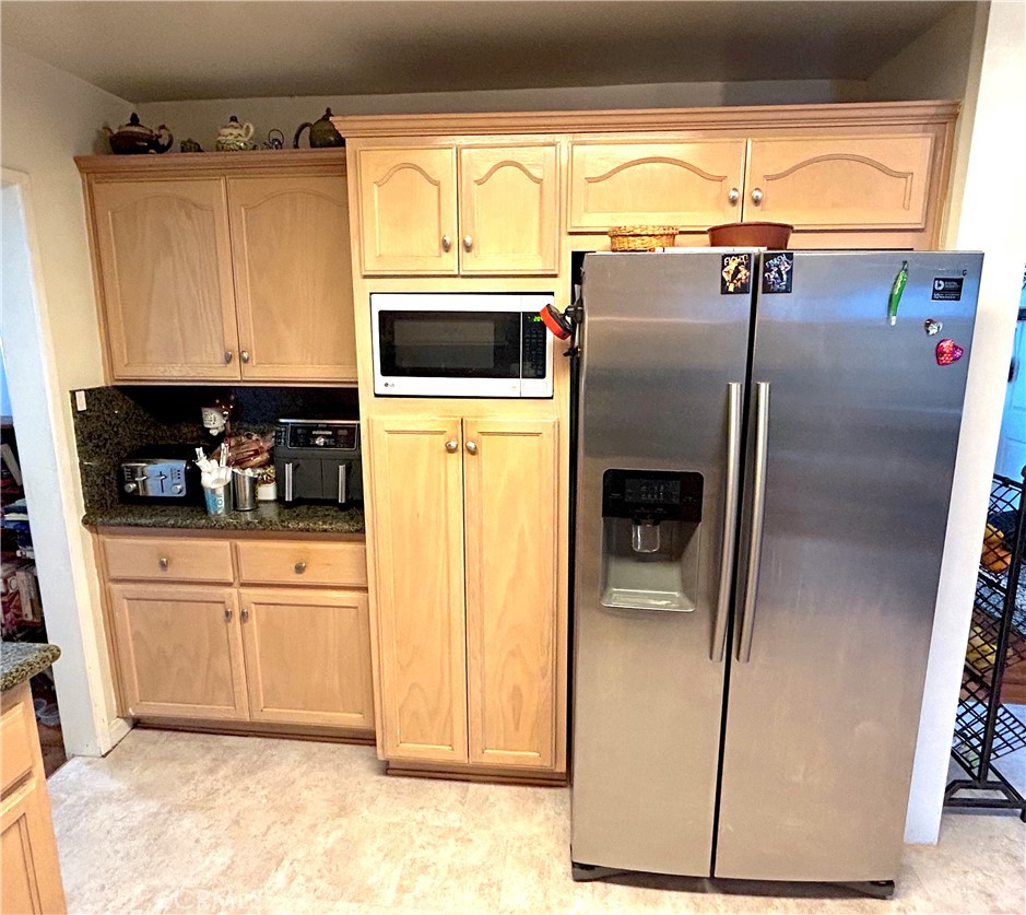 9530 Bexley Drive Pico Rivera, CA 90660 - Photo 10 of 22 a kitchen with a refrigerator and a stove