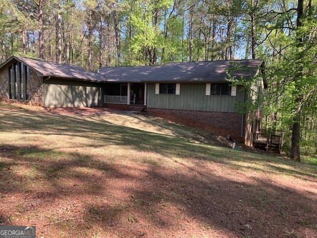4269 Southwest Bowen Road Stockbridge, GA 30281 - Photo 1 of 1 a view of a house with a yard and garage