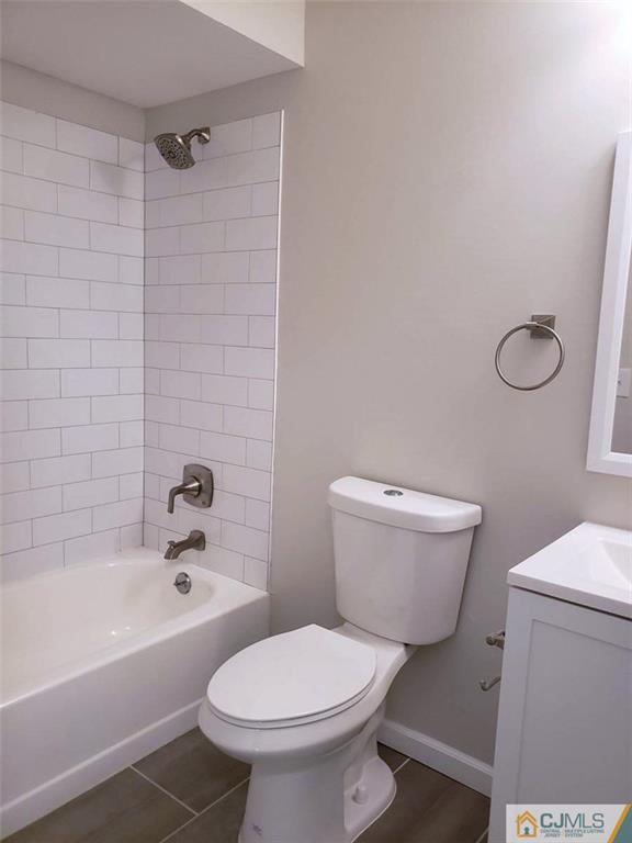 148 Redpine Loop Old Bridge, NJ 08857 - Photo 14 of 20 a white toilet sitting next to a bath tub