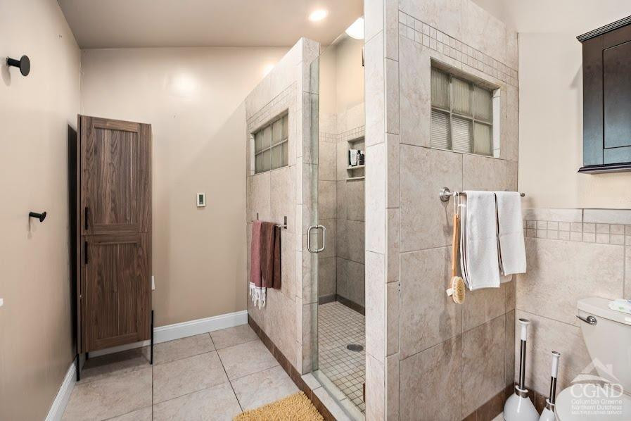 167 Dunbar Road Claverack, NY 12534 - Photo 17 of 37 a bathroom with a shower and mirror