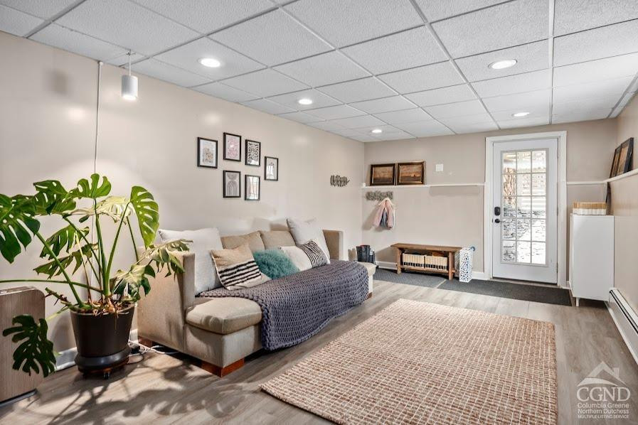 167 Dunbar Road Claverack, NY 12534 - Photo 22 of 37 a living room with furniture and a potted plant