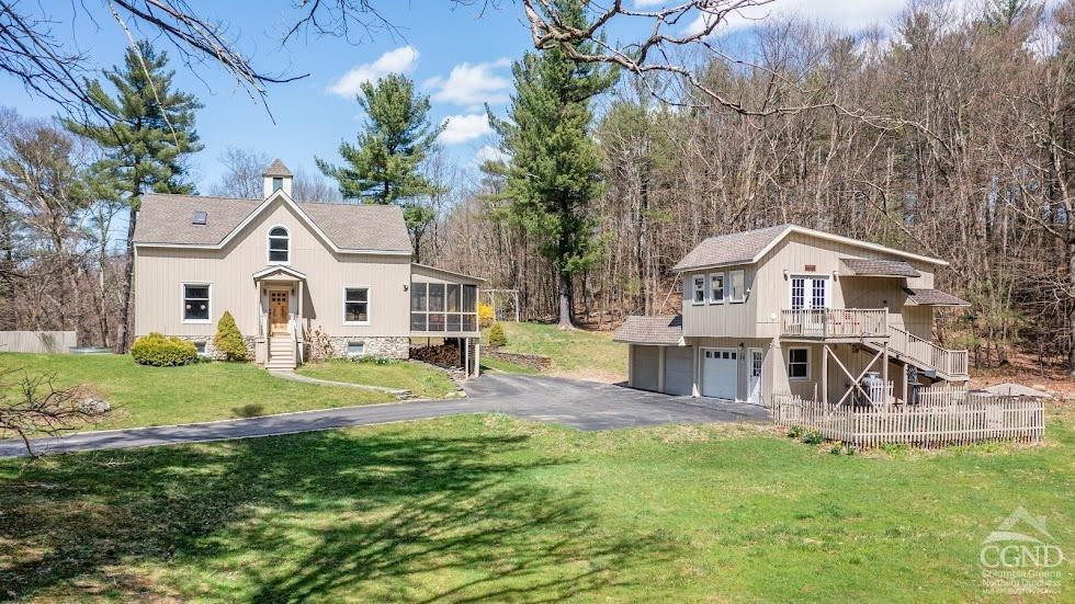 167 Dunbar Road Claverack, NY 12534 - Photo 35 of 37 a view of a house with a big yard and large trees