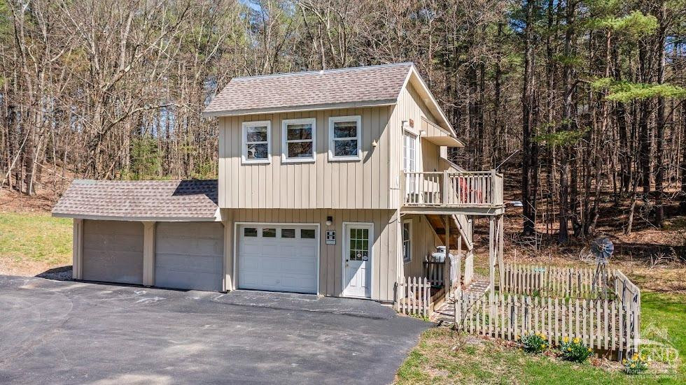 167 Dunbar Road Claverack, NY 12534 - Photo 4 of 37 a front view of a house with a garden