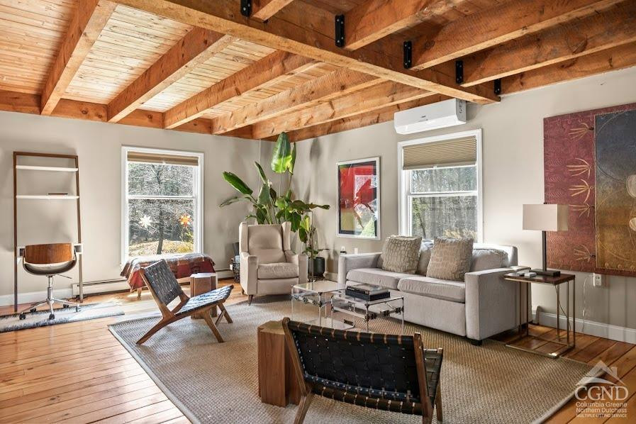 167 Dunbar Road Claverack, NY 12534 - Photo 9 of 37 a living room with furniture and a large window