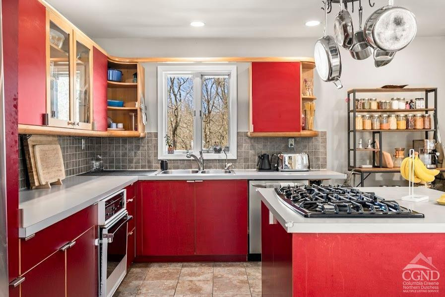 167 Dunbar Road Claverack, NY 12534 - Photo 10 of 37 a kitchen with stainless steel appliances granite countertop a stove a sink and a microwave